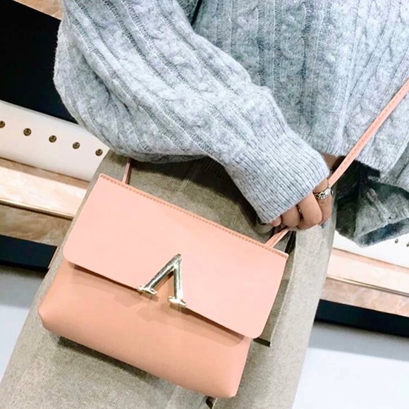 Invisible Wings Handbags - ✨Host Pick✨ V Cut Crossbody Bag